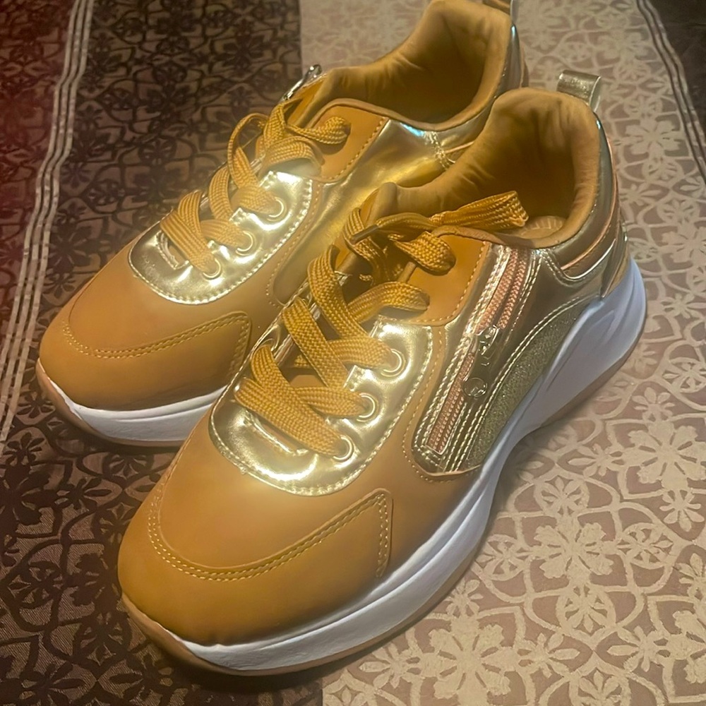 Tan and gold sneakers only worn once